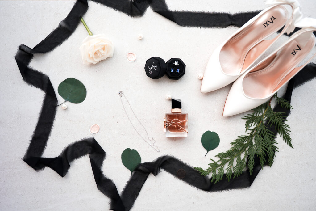 Photos of brides accessories on her wedding day at Sparrow Lane events in Spruce Grove Alberta, taken by Alberta Wedding Photographer